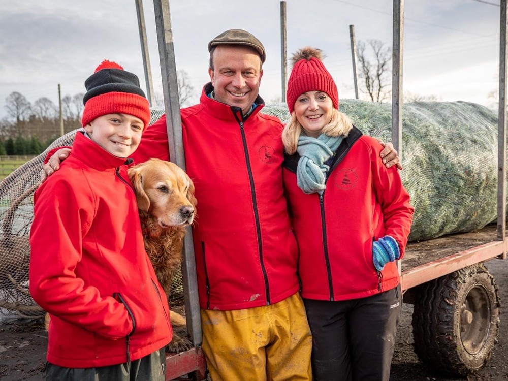 Olly and Kirsty Combes with their son and dog, from York Christmas Trees